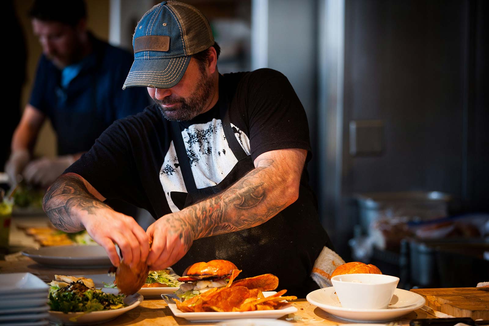 A chef plating food 